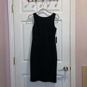 Black knee length dress. New with tag